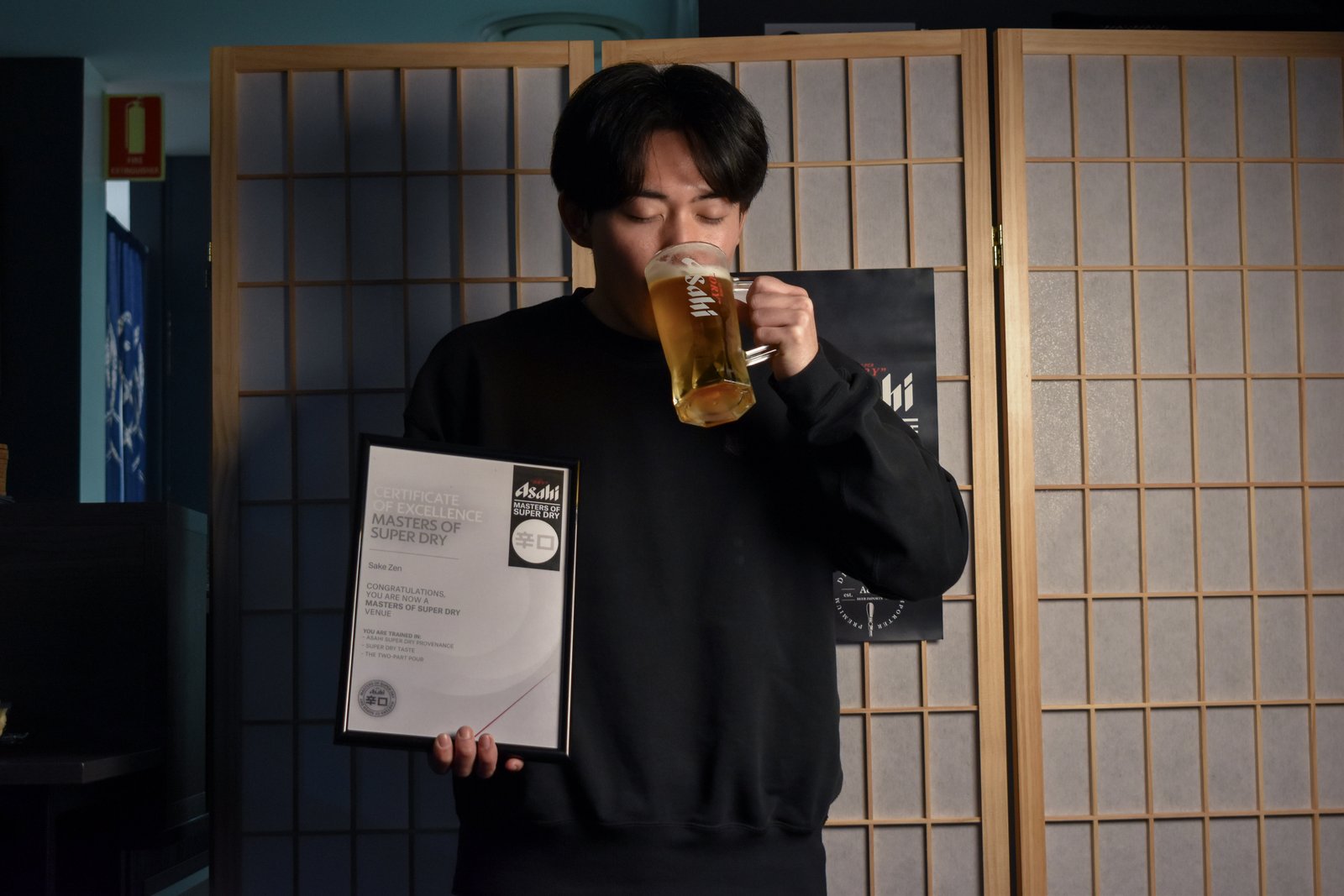 Hikaru celebrating Sake Zen's Asahi Masters of Super Dry certification