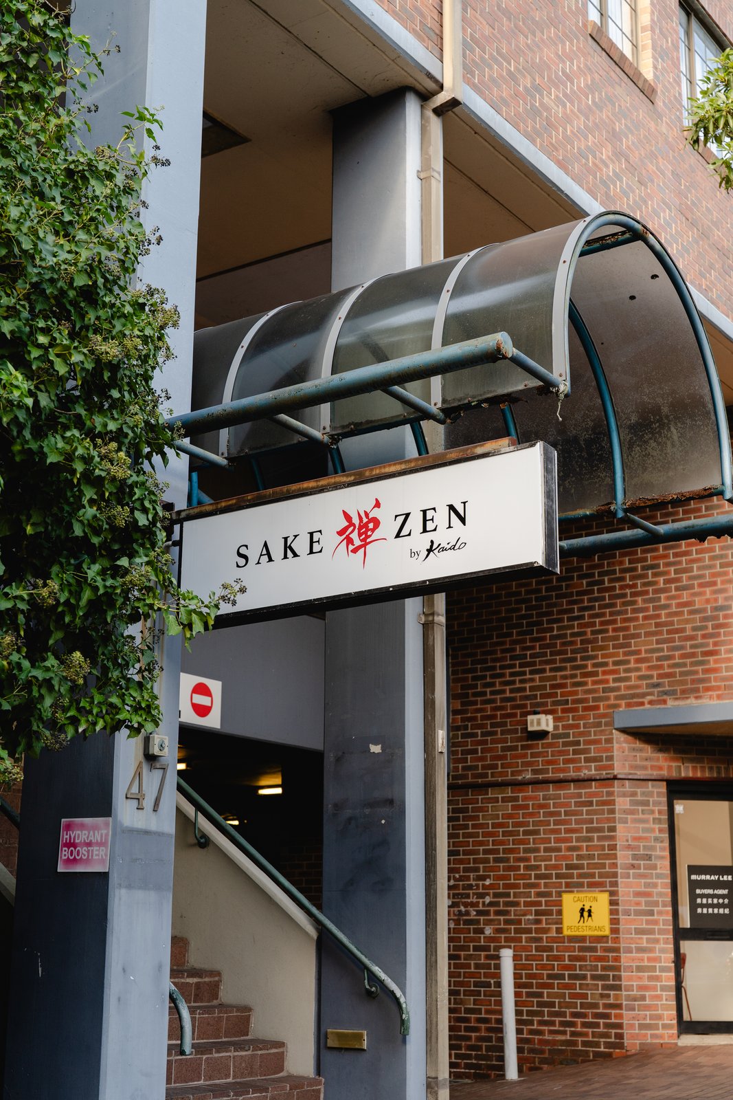 The Sake Zen sign above the entrance at 47 Neridah Street