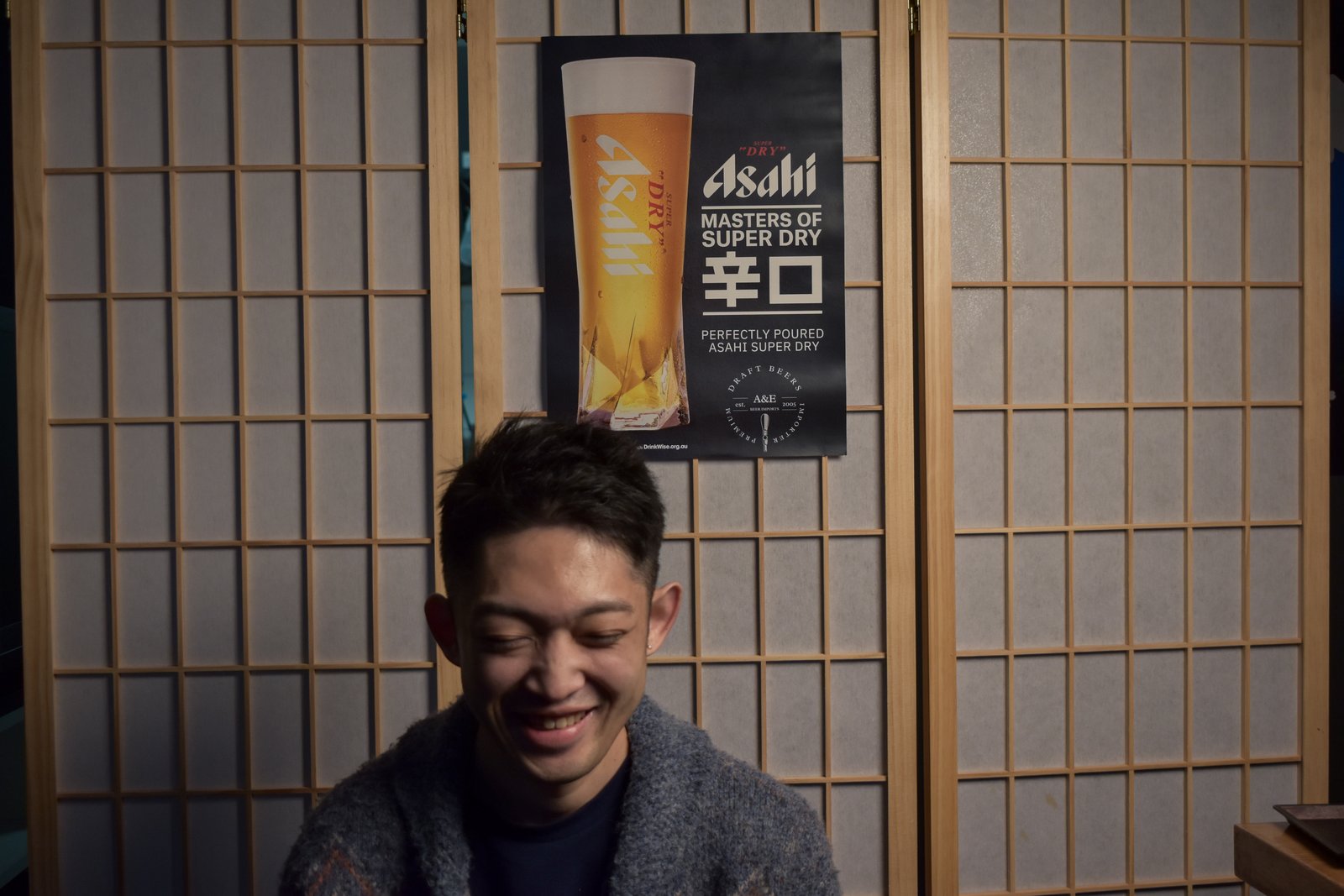 A Sake Zen team member sharing a laugh